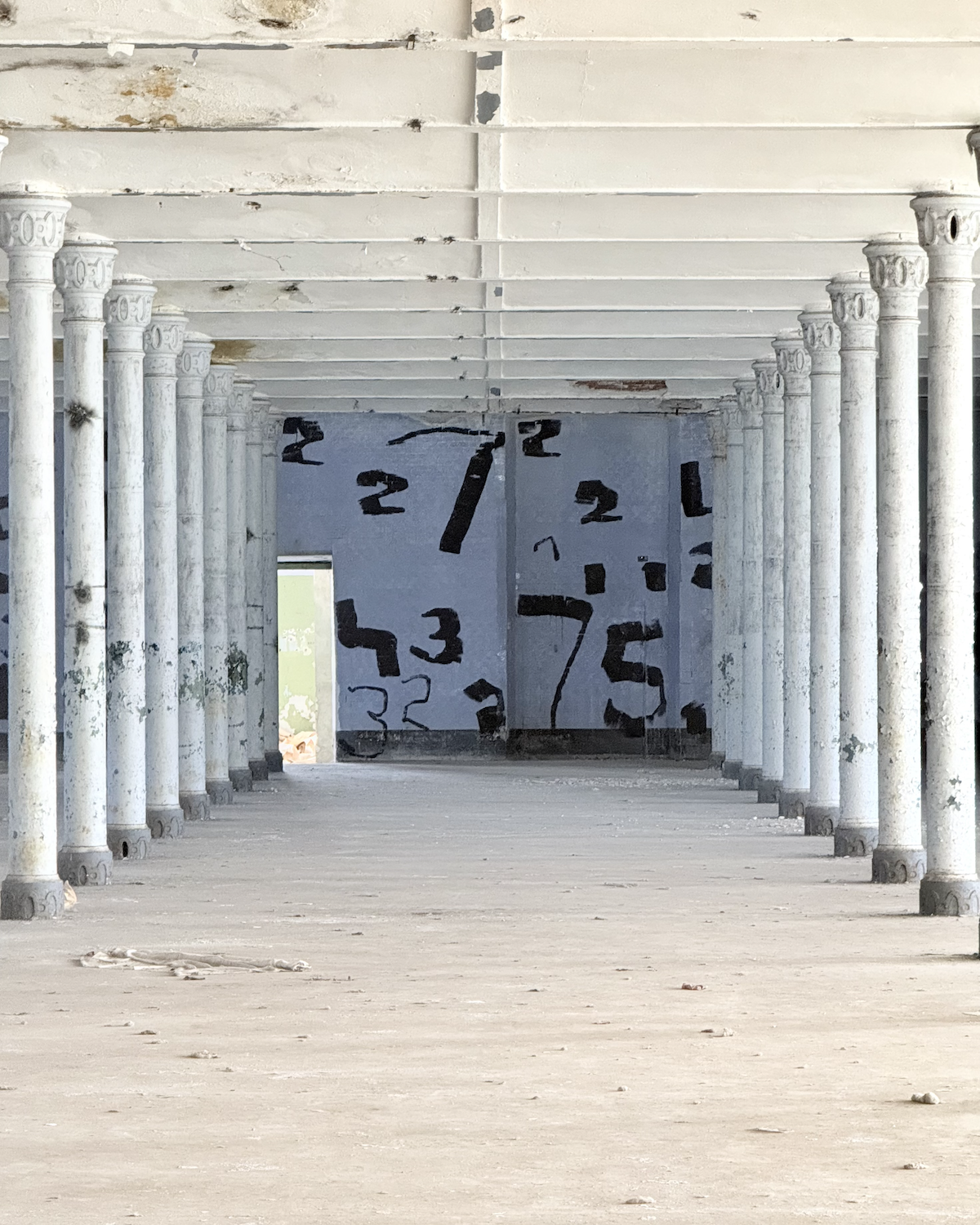Must sinivalgel (Detail)
Oleksiy Koval, 2026
approx. 4 m × 30 m, wall paint on tiles
Kreenholmi Manufaktuur, Narva